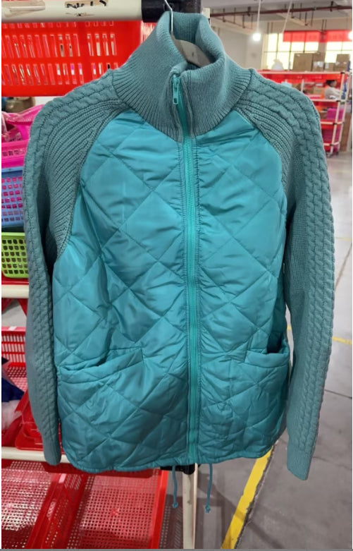 Veste d’hiver femme à col montant avec poches et fermeture zippée